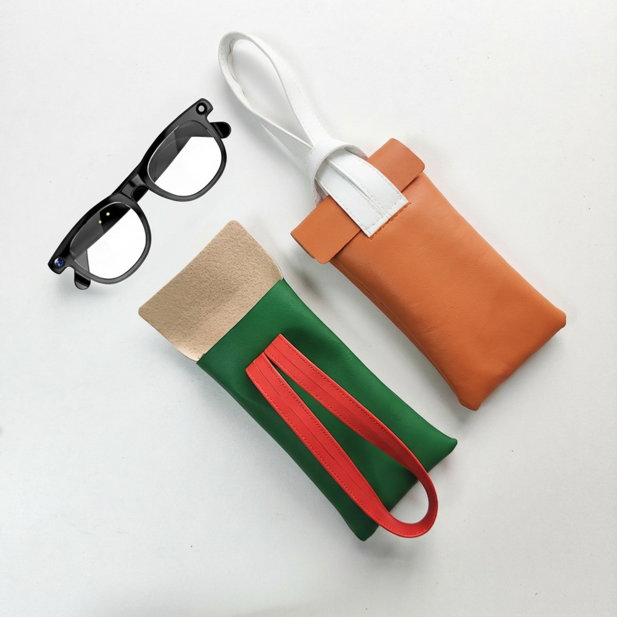 Two colorful pouches with a pair of glasses on a light gray background